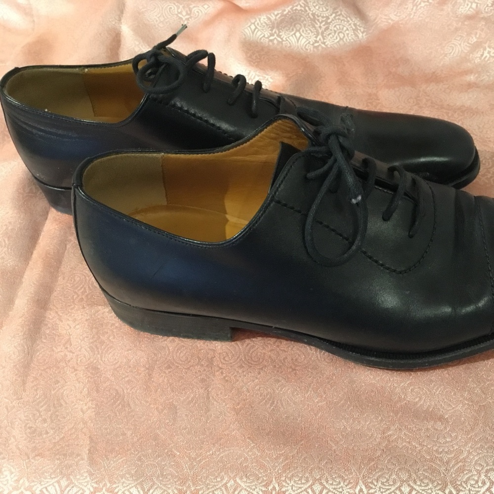 Gucci pair of black shoes